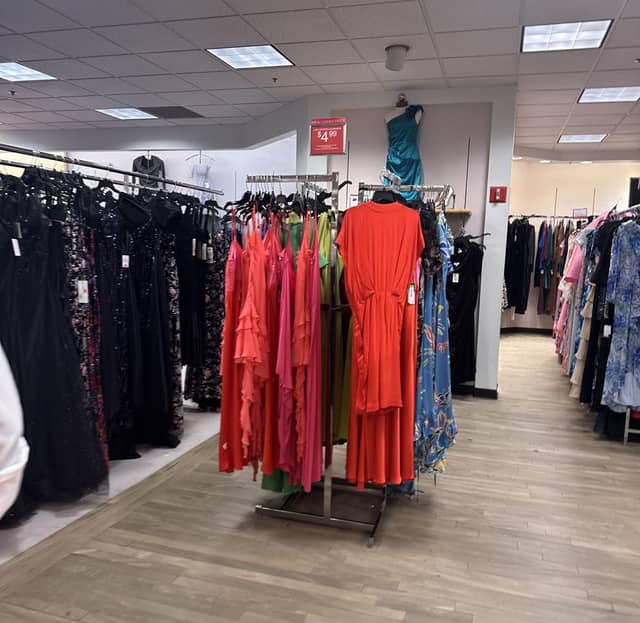 Colorado Springs: a dress rack with a "Last chance clearance" sign - $4.99.