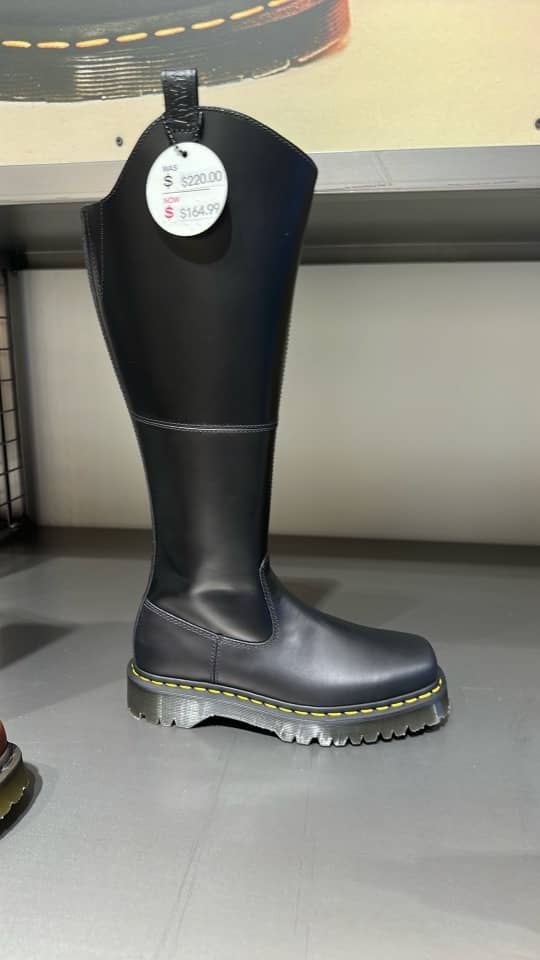 Tall Dr. Martens boots with a SALE tag - $220 instead of $245 (San Francisco)