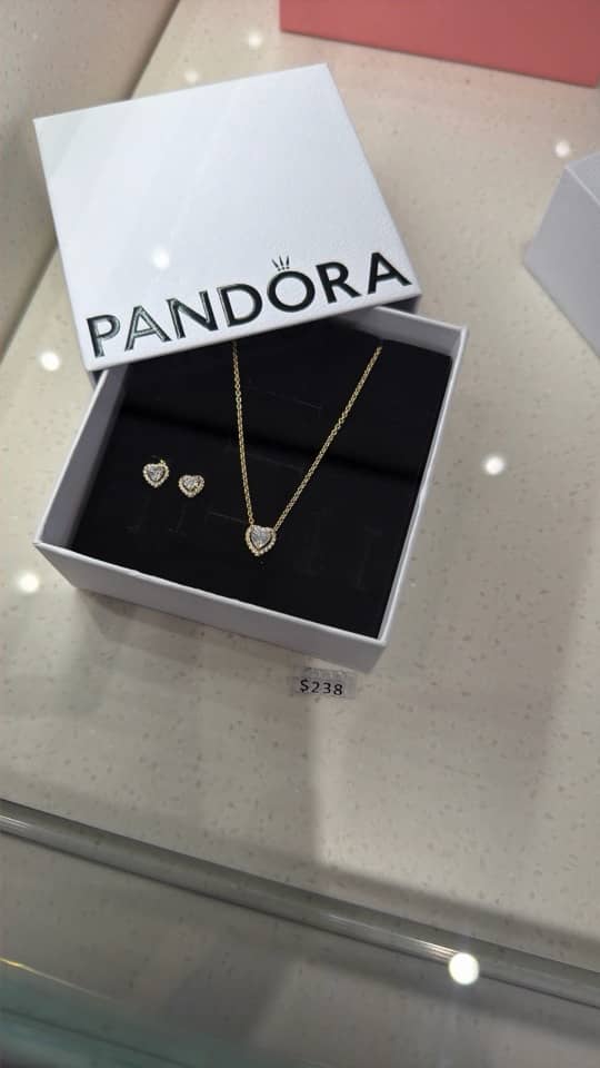 Heart pendant and earrings in a gift box for $238