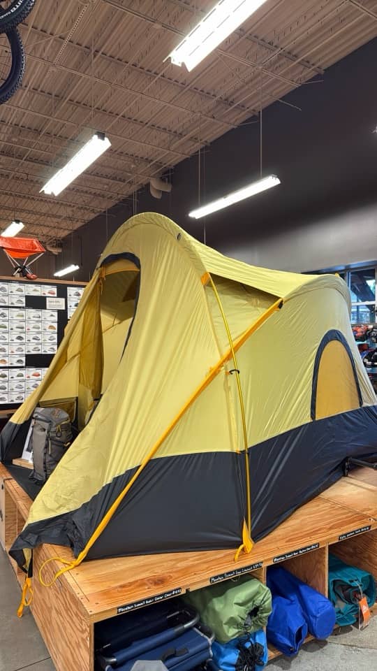 The tent section at REI - the models are set up, with boxes underneath