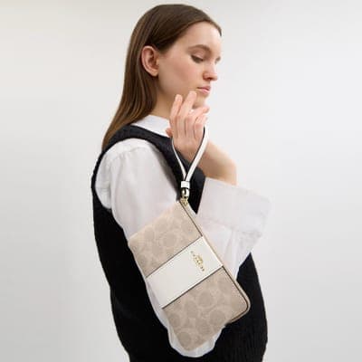 Coach Outlet Corner Zip Wristlet In Signature Canvas With Stripe 3
