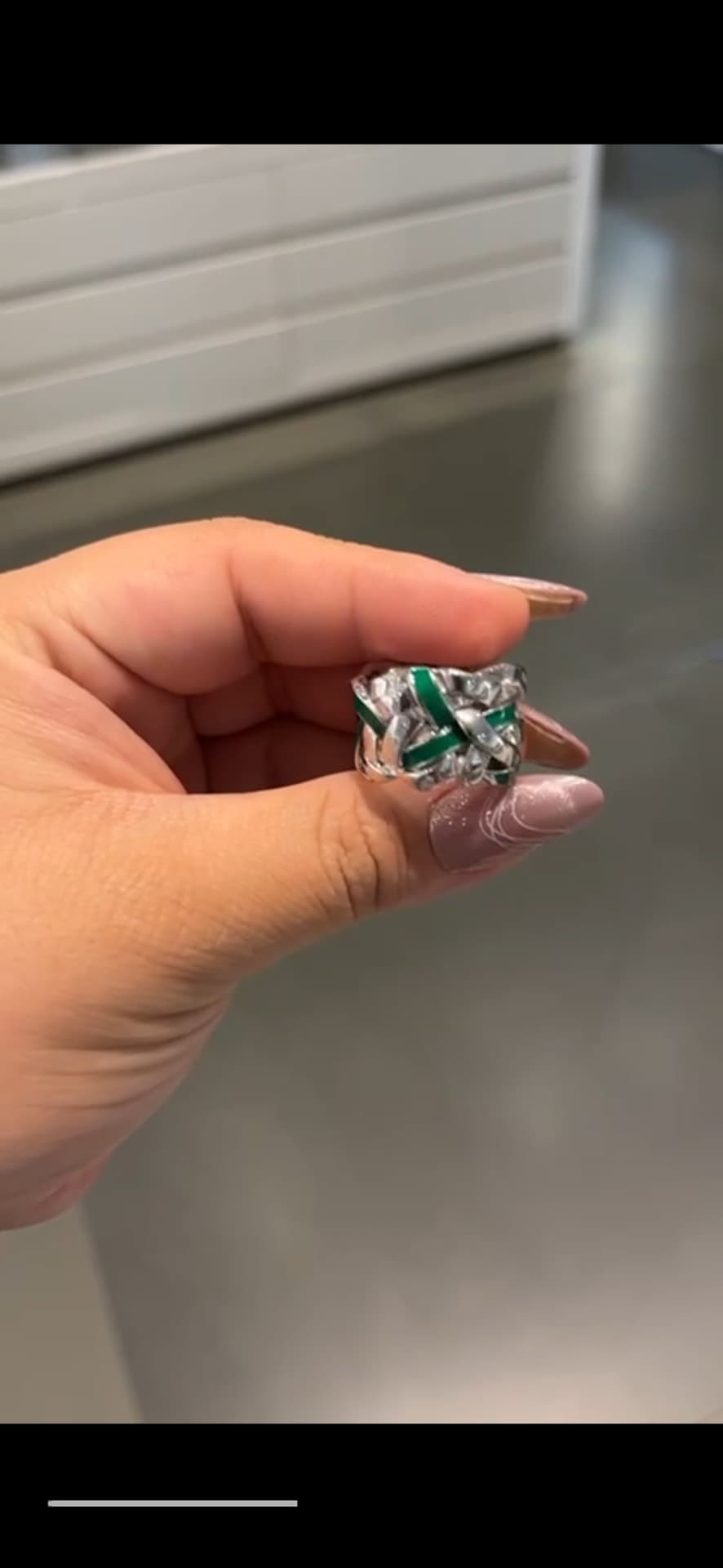 Elegant Silver Ring with Green Accent