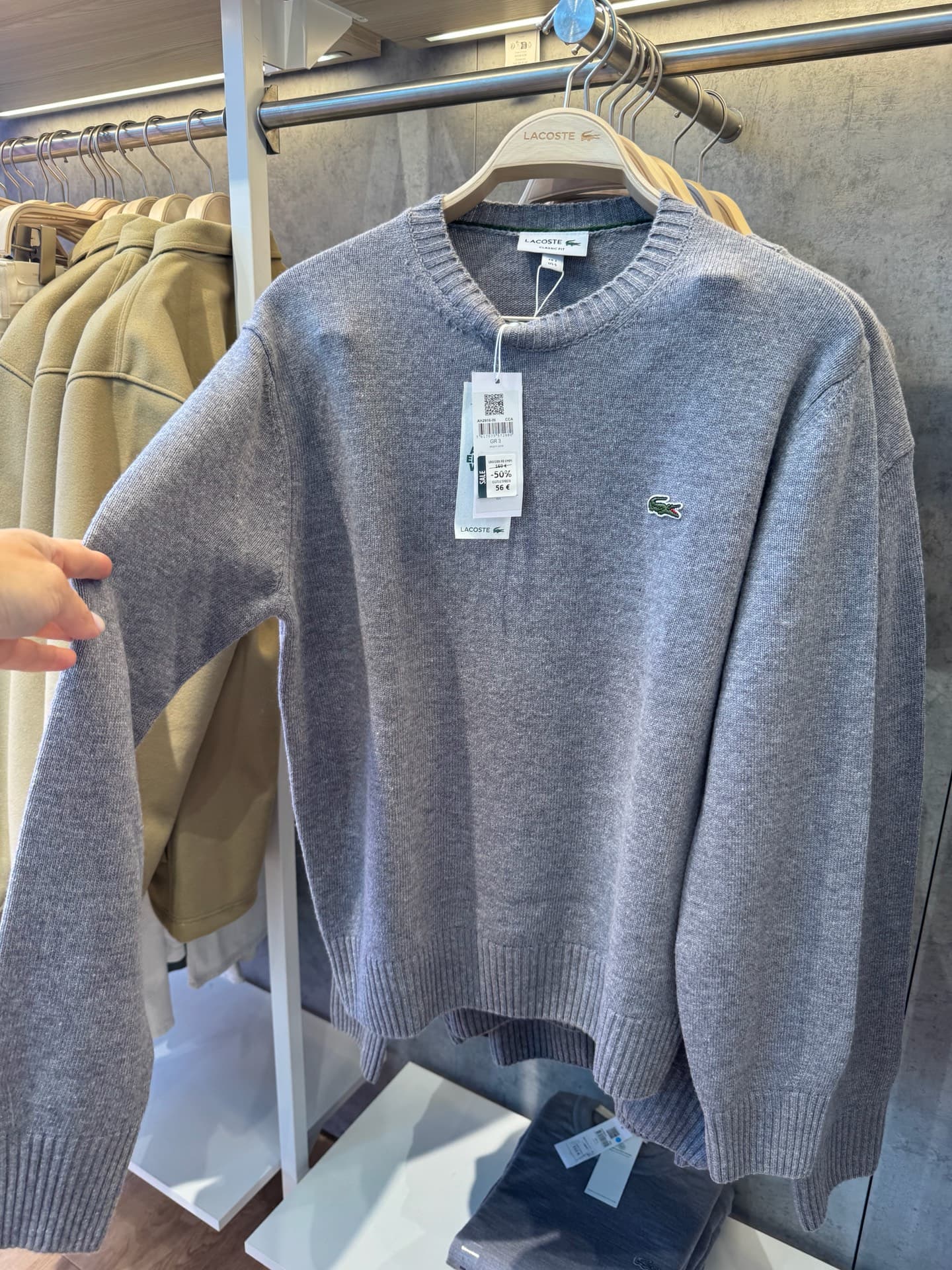 Серый свитер Lacoste